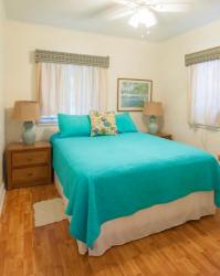 Clean and comfortable is the best way to describe our cottages. Most of them have a queen in each of the two bedrooms, though a couple of cottages have a queen in one bedroom and two twins in the other. The one bedroom cottage has a king in the bedroom, and they all have a futon in the living area.
We offer cottages for couples and cottages for families. We even have cottages for four fishermen where each man gets his own bed.